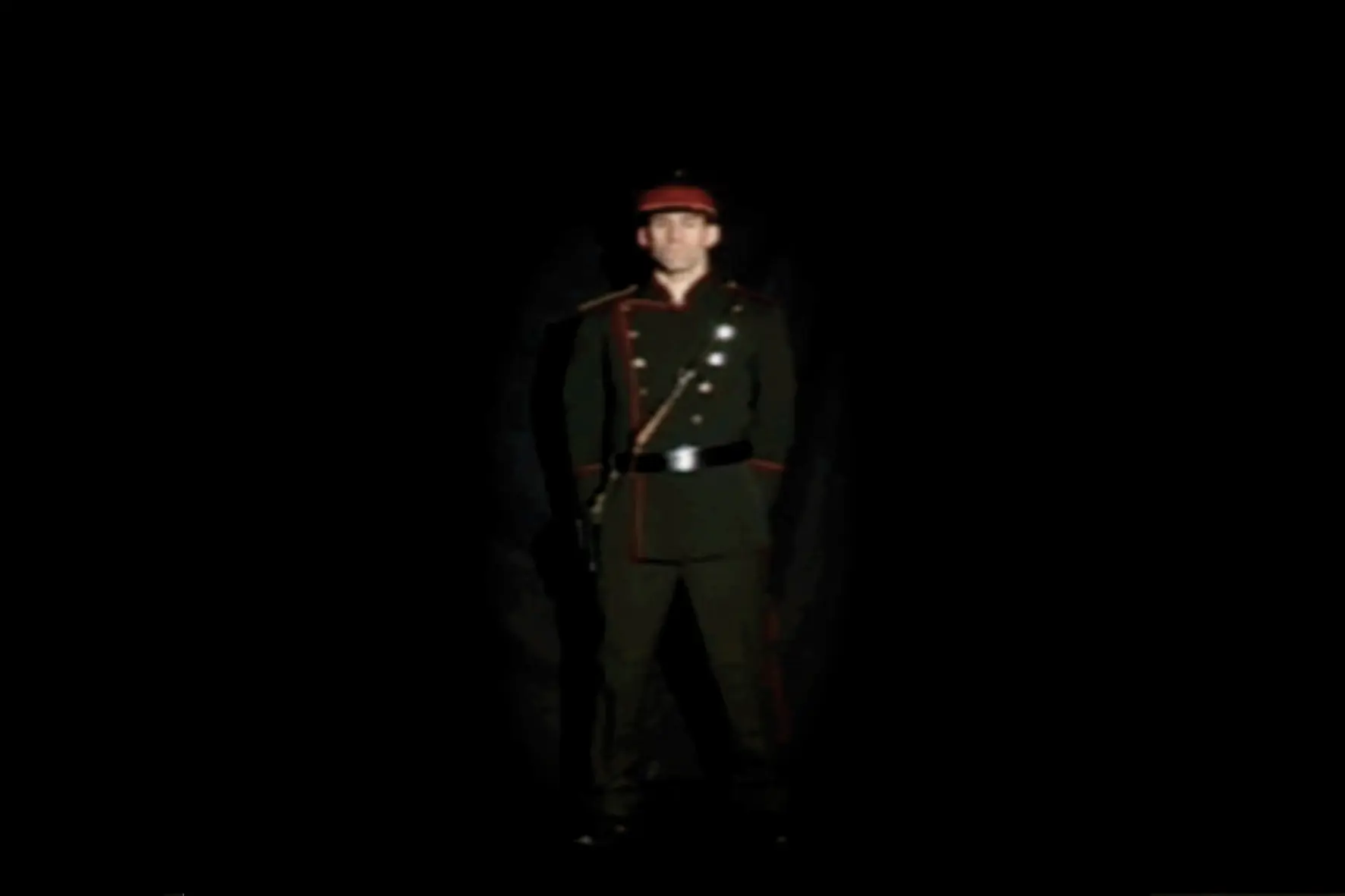 Production photographs showing the actor in uniform and the filming setup